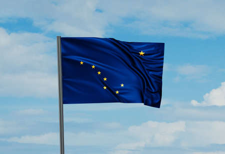 Alaska US state flag waving in the wind on sky with cloudsの写真素材