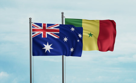 Republic of Senegal and Australia flag waving together in the wind on blue sky, two country cooperation conceptの写真素材