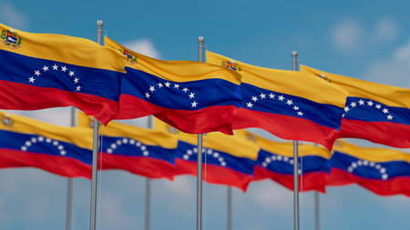 Venezuela many flags in row waving together on blue cloudy skyの写真素材