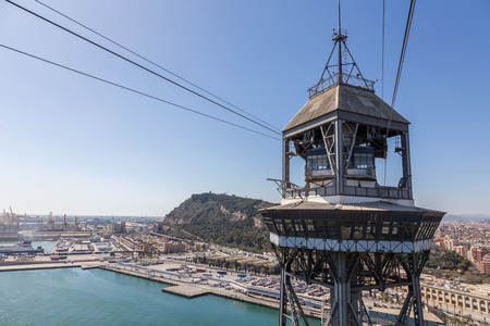 View of cableway tower in the  harbour of Barcelonaの写真素材