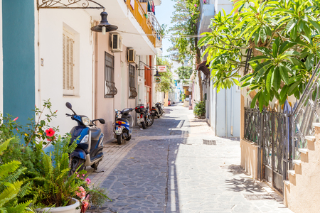19 JUNE 2017. View of calm street with parked motorbikes in Rhodes town. Rhodes town, Greeceのeditorial素材