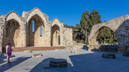 14 JUNE 2017. Tourists at the remainings of ancient church, town of Rhodes, Rhodes island, Greeceのeditorial素材