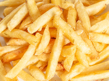 Closeup view of fried potatos. Food background