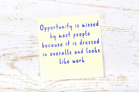 Positive inspiring quote handwritten on sticky note.の写真素材