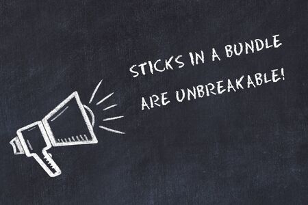 Chalk board sketch with loudspeaker and handwritten short motto.の写真素材