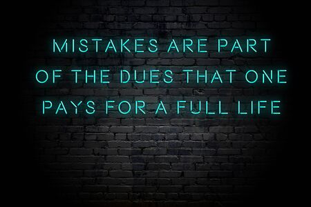 Neon inscription of positive wise motivational quote against brick wall .の写真素材