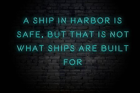 Neon inscription of positive wise motivational quote against brick wall .の写真素材