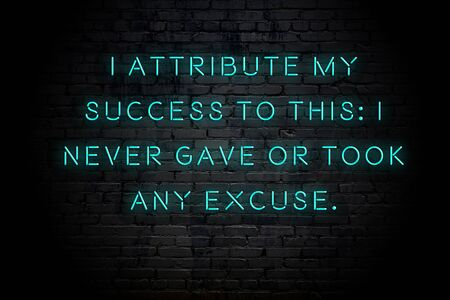 Neon inscription of positive wise motivational quote against brick wall .の写真素材