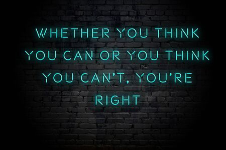 Neon inscription of positive wise motivational quote against brick wall .の写真素材