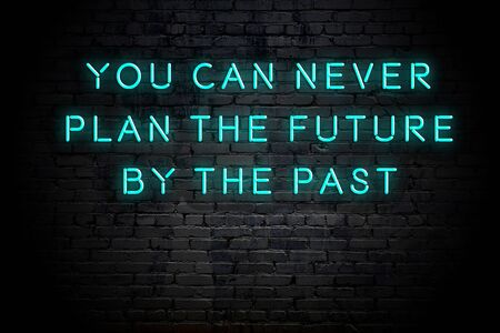 Neon inscription of positive wise motivational quote against brick wall .の写真素材