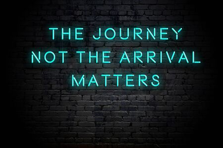 Neon inscription of positive wise motivational quote against brick wall .の写真素材