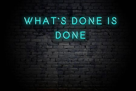 Neon inscription of positive wise motivational quote against brick wall .の写真素材