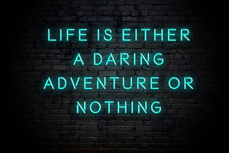 Neon inscription of positive wise motivational quote against brick wall .の写真素材