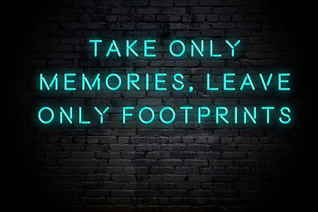 Neon inscription of positive wise motivational quote against brick wall .の写真素材