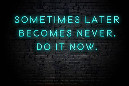Neon inscription of positive wise motivational quote against brick wall .の写真素材