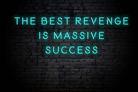 Neon inscription of positive wise motivational quote against brick wall .の写真素材