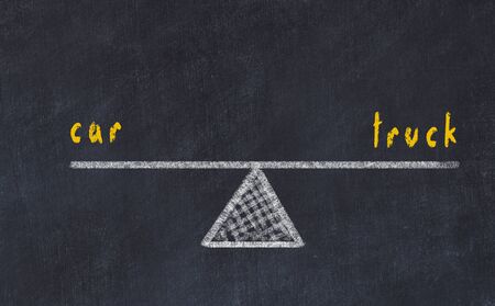 Chalk board sketch of scales. Concept of balance between car and truck.の写真素材