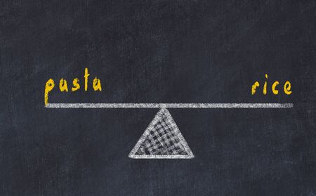 Chalk board sketch of scales. Concept of balance between pasta and rice.の写真素材
