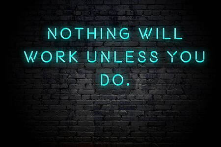 Neon inscription of positive wise motivational quote against brick wall .の写真素材