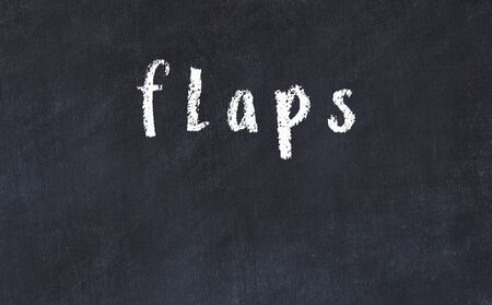 Chalk handwritten inscription flaps on black desk
