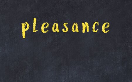 College chalkboard  with with handwritten inscription pleasance on itの写真素材