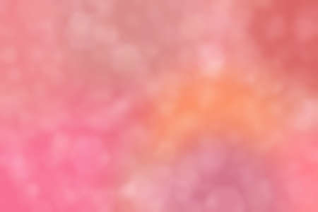 coral abstract defocused background with hexagon shape bokeh spotsの写真素材