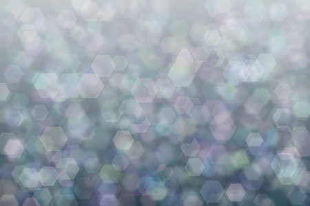 Colorful background with hexagon shaped bokeh spots. Abstraction