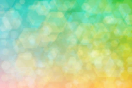 Abstract background with bokeh spots on gradient from cyan to yellow color nt their mixture.の写真素材