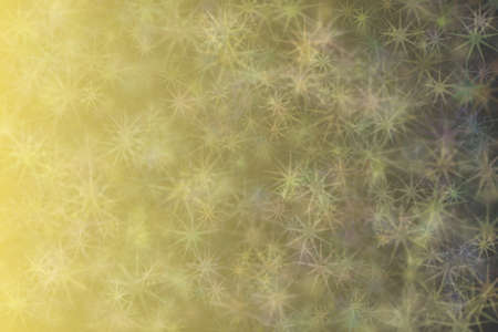 yellow and purple abstract defocused background with star shape bokeh spots