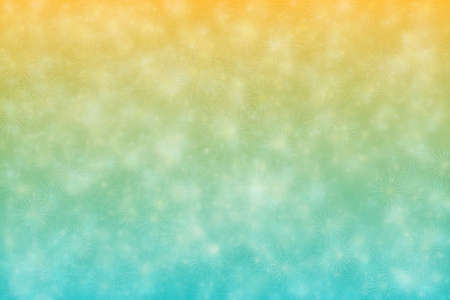 cyan and yellow abstract defocused background with star shape bokeh spots