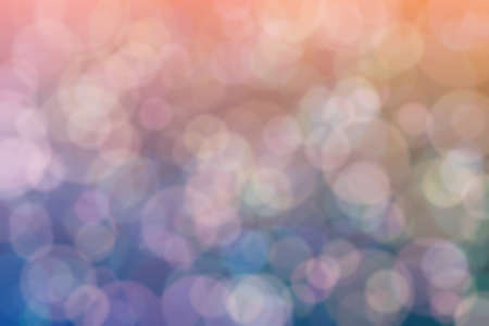 dark blue and pink abstract defocused background with circle shape bokeh spots