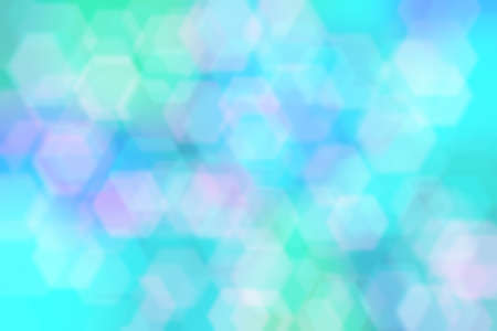 Bright pink and light blue abstract background with hexagon shaped bokeh.