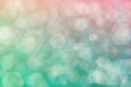 tan and turquoise abstract defocused background, hexagon shape bokeh pattern.の写真素材
