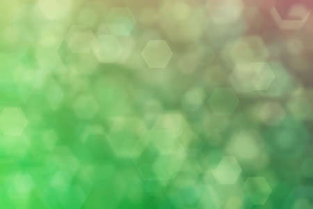 olive and green abstract defocused background, hexagon shape bokeh pattern.の写真素材