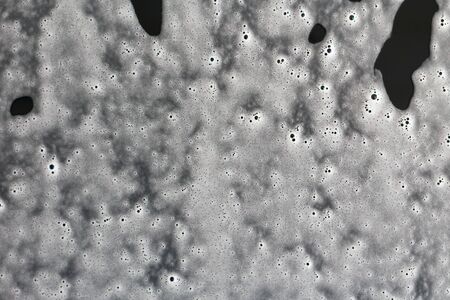 Foam on the car. Car wash in the garage. Background