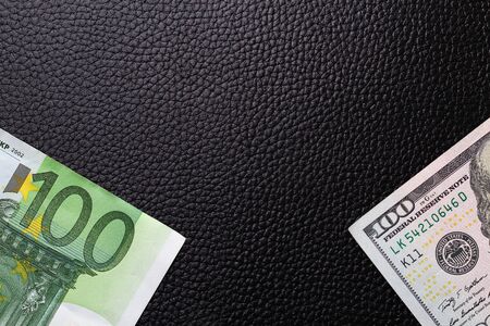 Dollars and euros. The concept of currency exchange transactions, money transfers and the choice for investmentの写真素材