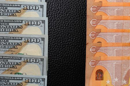 Dollars and euros. The concept of currency exchange transactions, money transfers and the choice for investmentの写真素材