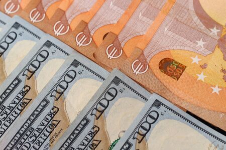 Dollars and euros. The concept of currency exchange transactions, money transfers and the choice for investmentの写真素材