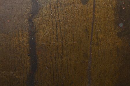 Scratched textured surface of old copper, backgroundの写真素材