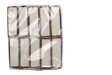 Packing of matches in polyethylene on a white background, isolatedの写真素材