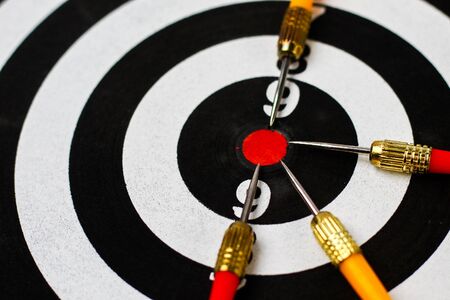 Target Darts. Red center, a dozen. Metaphor of success and achievement plans, backgroundの写真素材