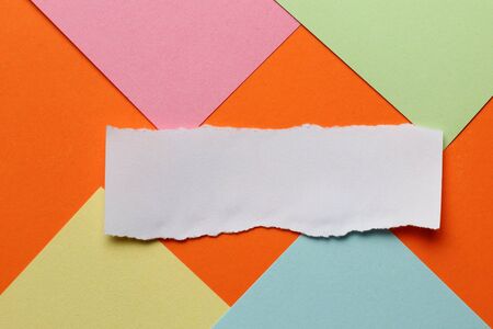 Torn paper forms a copyspace frame for text or label.