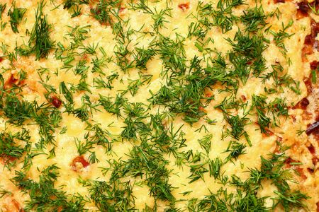 Traditional Italian dish Lasagna with cheese and herbs close-up, backgroundの写真素材