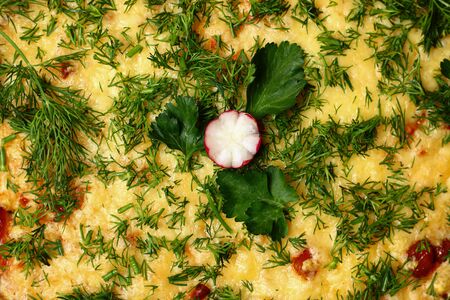 Traditional Italian dish Lasagna with cheese and herbs close-up, background