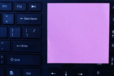 Blank sticker for the inscription, on the black keyboard, toned