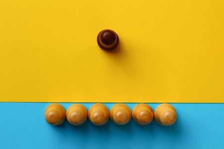 Abstract art concept of an ideological leader and organizer of management based on chess pawns