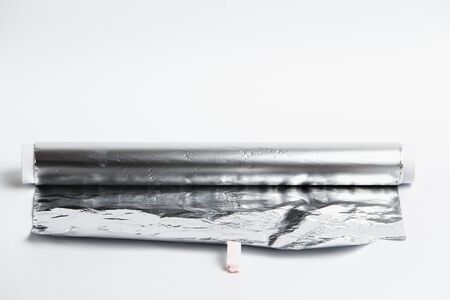 Aluminum foil for baking on a light backgroundの写真素材