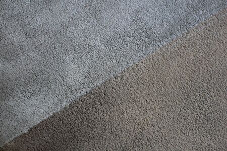 Diagonal of a concrete texture two-tone wallの写真素材