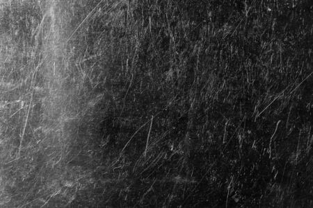 Dark textured scratched stainless steel surface. Blank for inscription or text. Substrate for design.の写真素材