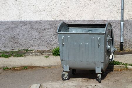 Trash can in urban environment, symbolic abstract backgroundの写真素材